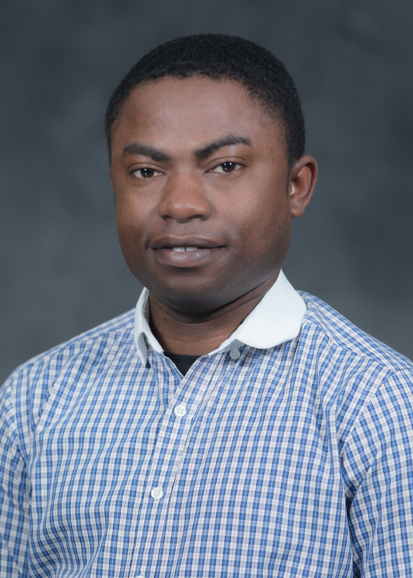 headshot of Sam Adeapin